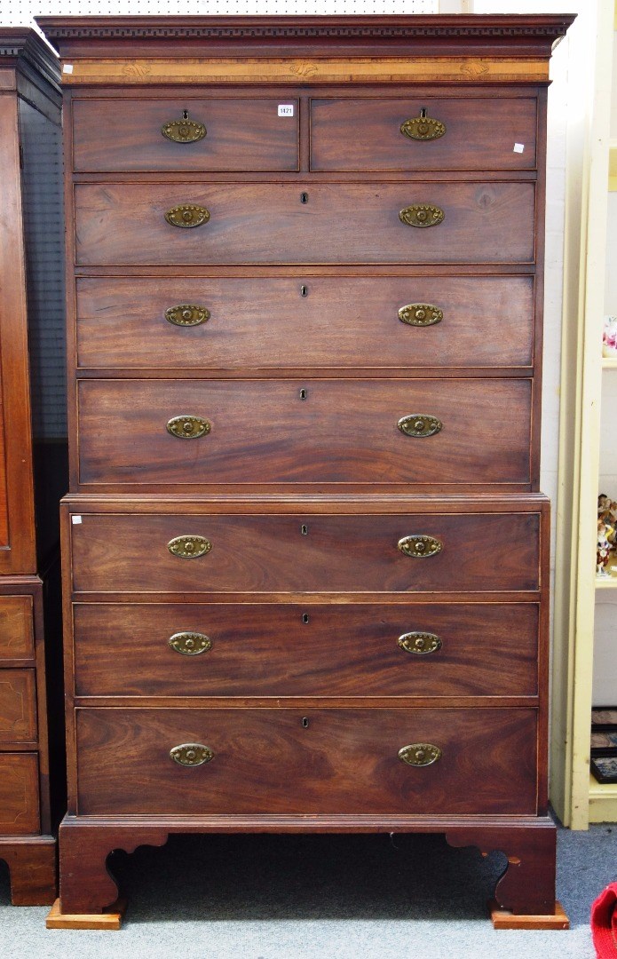 Appraisal: A George III inlaid mahogany chest on chest of two