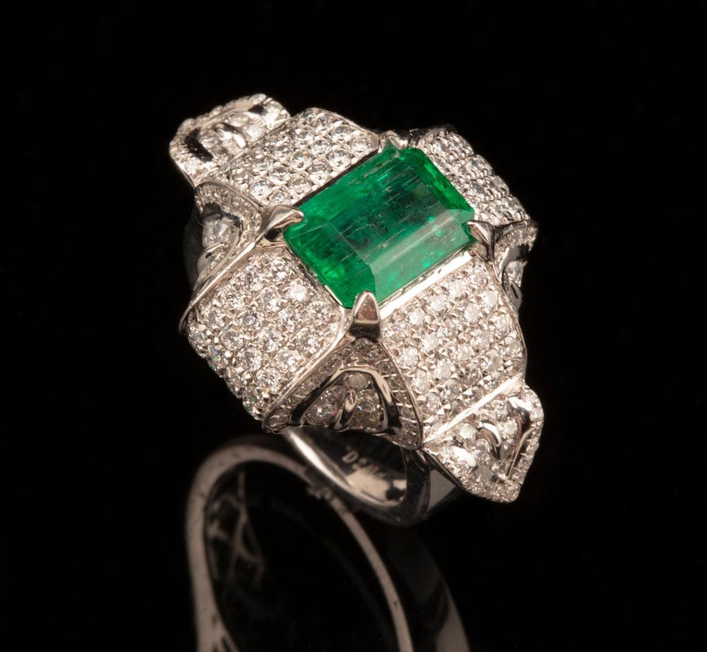 Appraisal: Platinum Emerald and Diamond Ring center prong-set rectangular cut-cornered step-cut