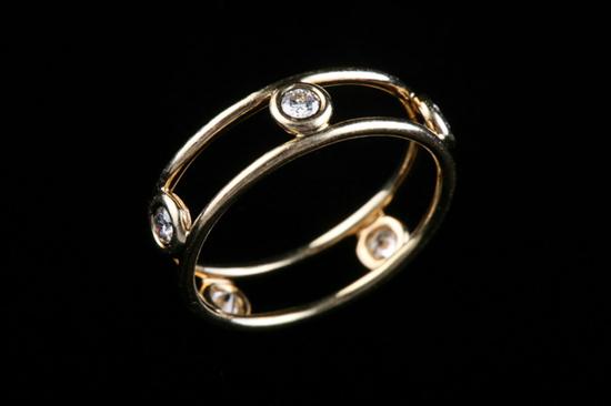 Appraisal: TIFFANY CO ELSA PERETTI K YELLOW GOLD AND DIAMOND BAND