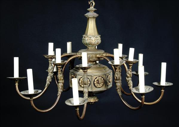 Appraisal: A gilt brass sixteen light chandelier in the early th