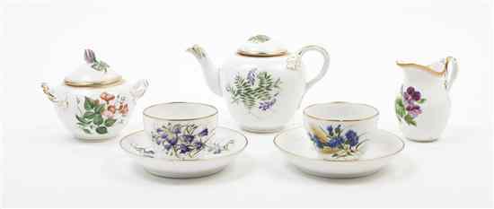 Appraisal: A Royal Copenhagen Diminutive Tea Set comprising a teapot creamer