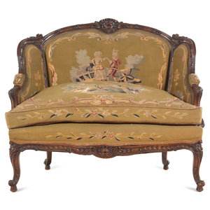 Appraisal: A Louis XV Style Carved Walnut Settee with Tapestry Upholstery