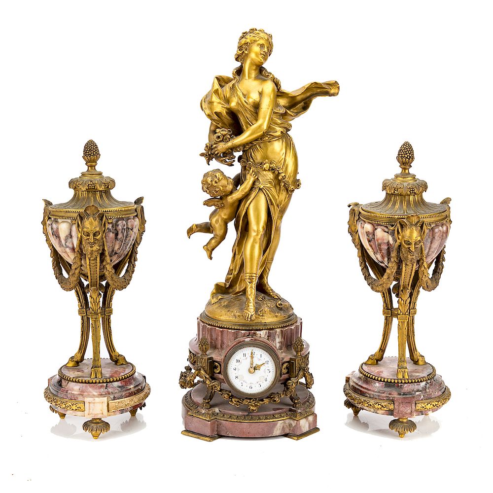 Appraisal: Napoleon III Rouge Marble Bronze Clock Garniture circa rouge marble