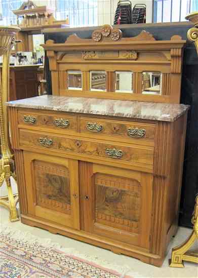 Appraisal: VICTORIAN WALNUT SIDE CABINET American c having a mirror-paneled crest