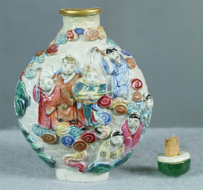 Appraisal: Chinese molded porcelain snuff bottle Famille Rose decoration stopper not