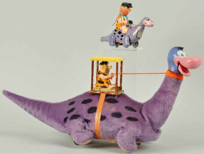 Appraisal: Lot of Marx Fred Flintstone Riding Dino Toys Description American