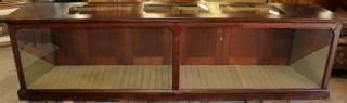 Appraisal: American mahogany display case American mahogany display case Interior has