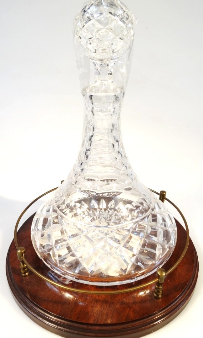 Appraisal: A Mappin Webb lead crystal ship's style decanter of compressed