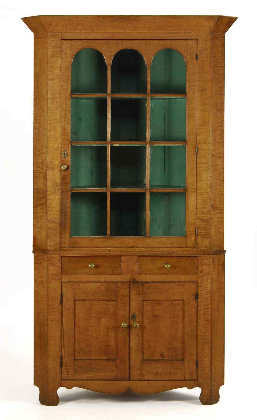 Appraisal: ANTIQUE AMERICAN TWO-PART CORNER CABINETCirca - In curly maple Upper