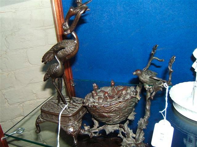 Appraisal: An Oriental bronze sculpture in the form of two birds