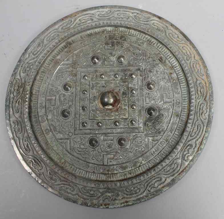 Appraisal: CHINESE SILVERED BRONZE ''TLV'' MIRROR TANG DYNASTY the circular disc