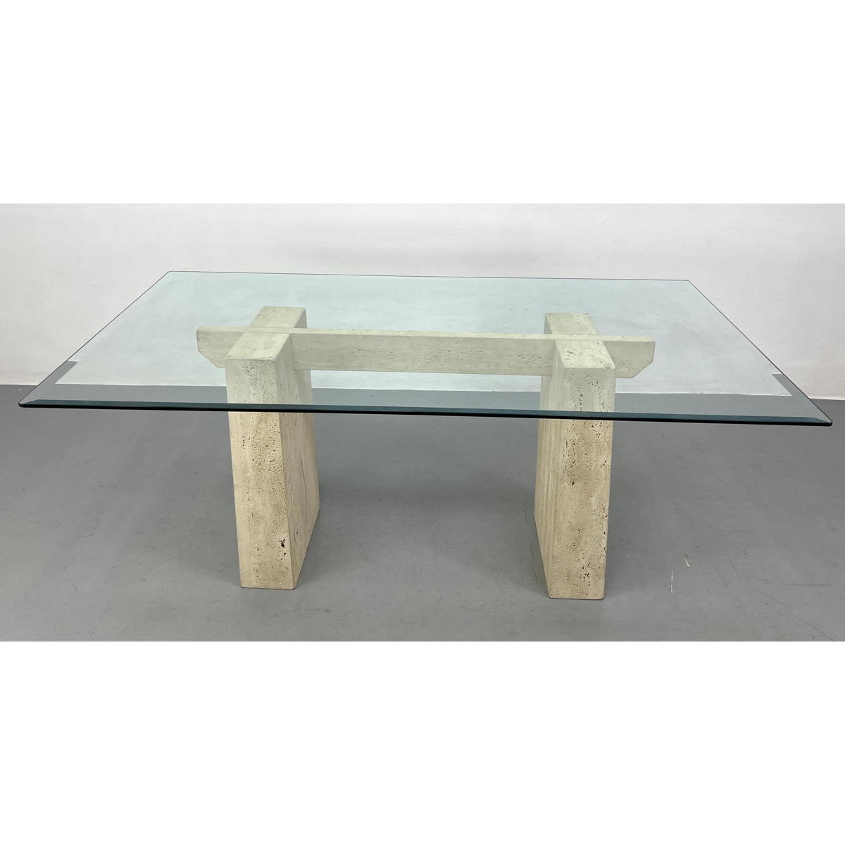 Appraisal: Minimalist Travertine Trestle Form Dining Table with Glass Top Dimensions