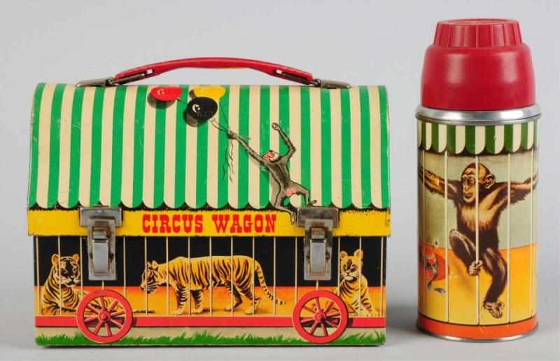 Appraisal: Tin Litho Circus Wagon Dome Lunch Box Circa American Thermos