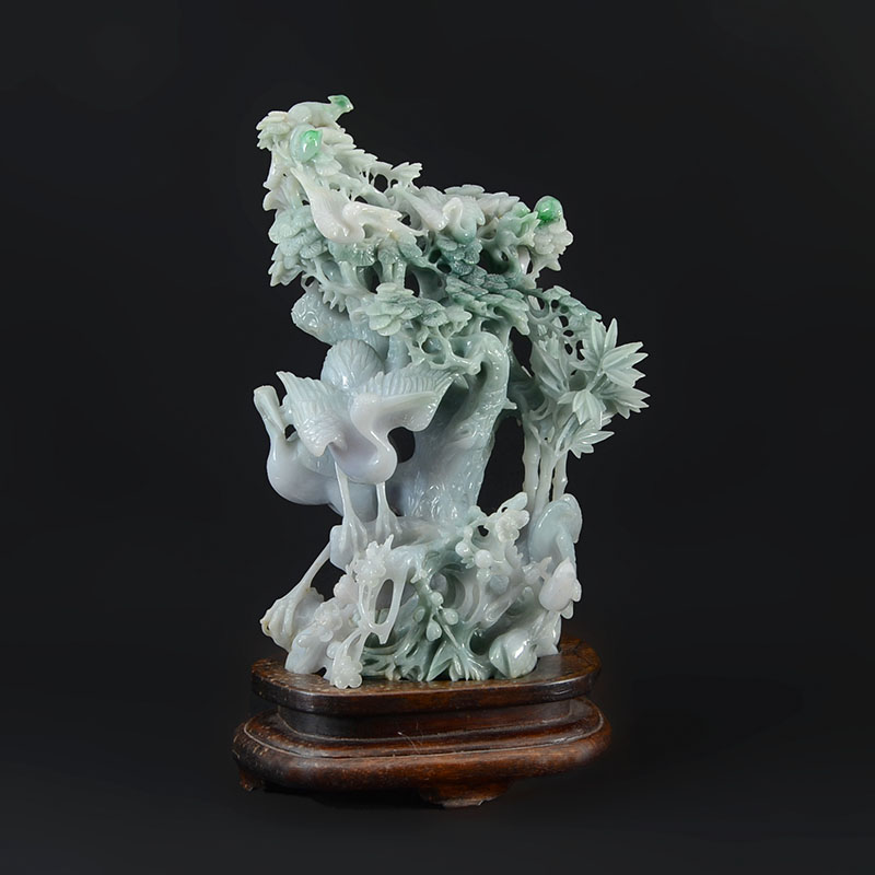 Appraisal: CHINESE CARVED JADEITE CRANES IN TREE FIGURAL GROUP Apple green