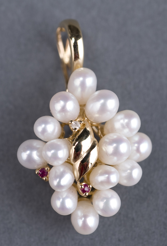 Appraisal: KT yellow gold pearl pendant enhancer The pendant contains pearls