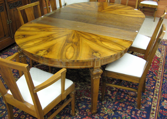 Appraisal: BURL WALNUT DINING TABLE AND CHAIR SET from the John