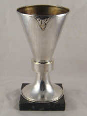 Appraisal: A plated Art Deco trophy vase on square marble base