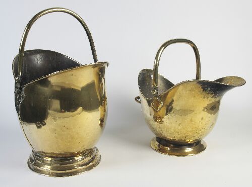 Appraisal: Two brass coal helmets of traditional form bellied bodies and