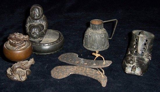 Appraisal: A bronze boot being eaten by four mice cm wide