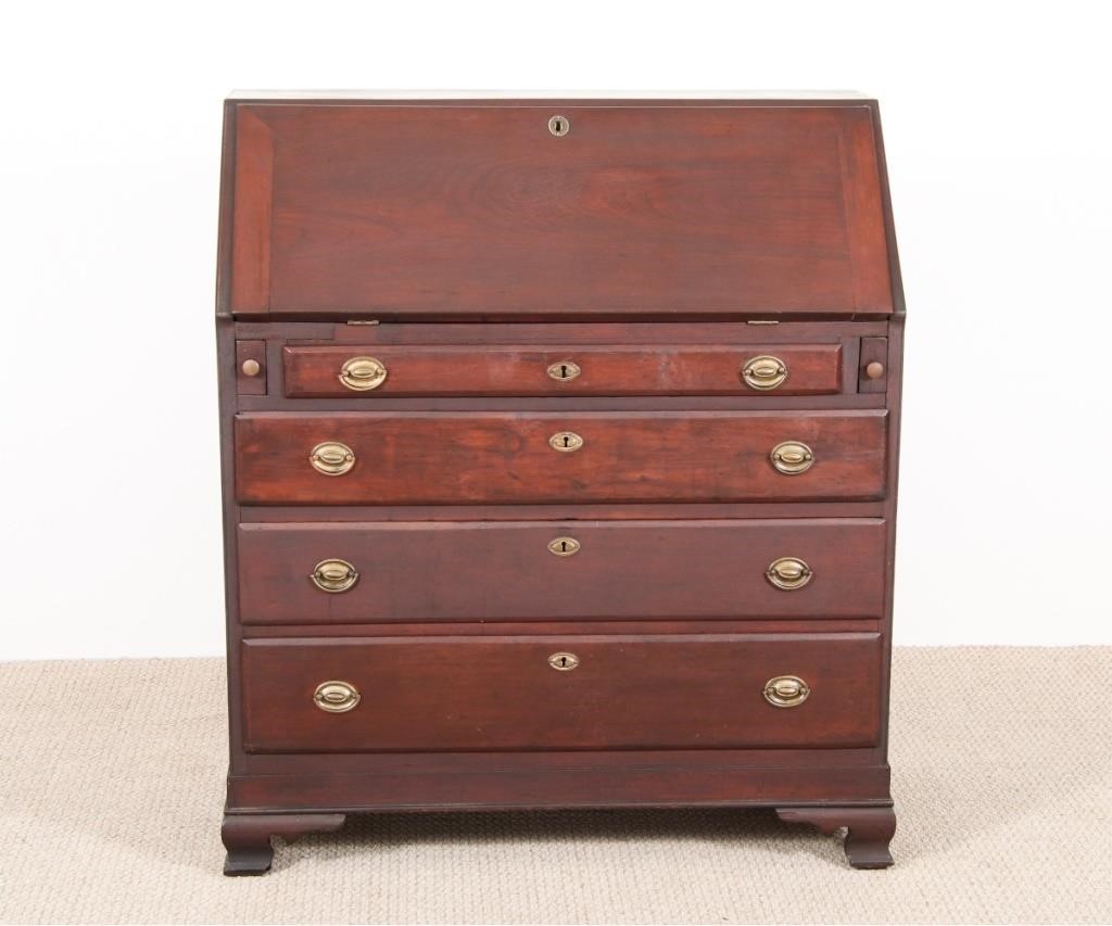 Appraisal: Pennsylvania Chippendale walnut slant lid desk circa with serpentine front