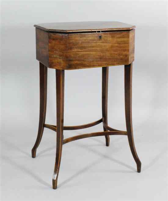 Appraisal: A George III crossbanded mahogany octagonal work table on square