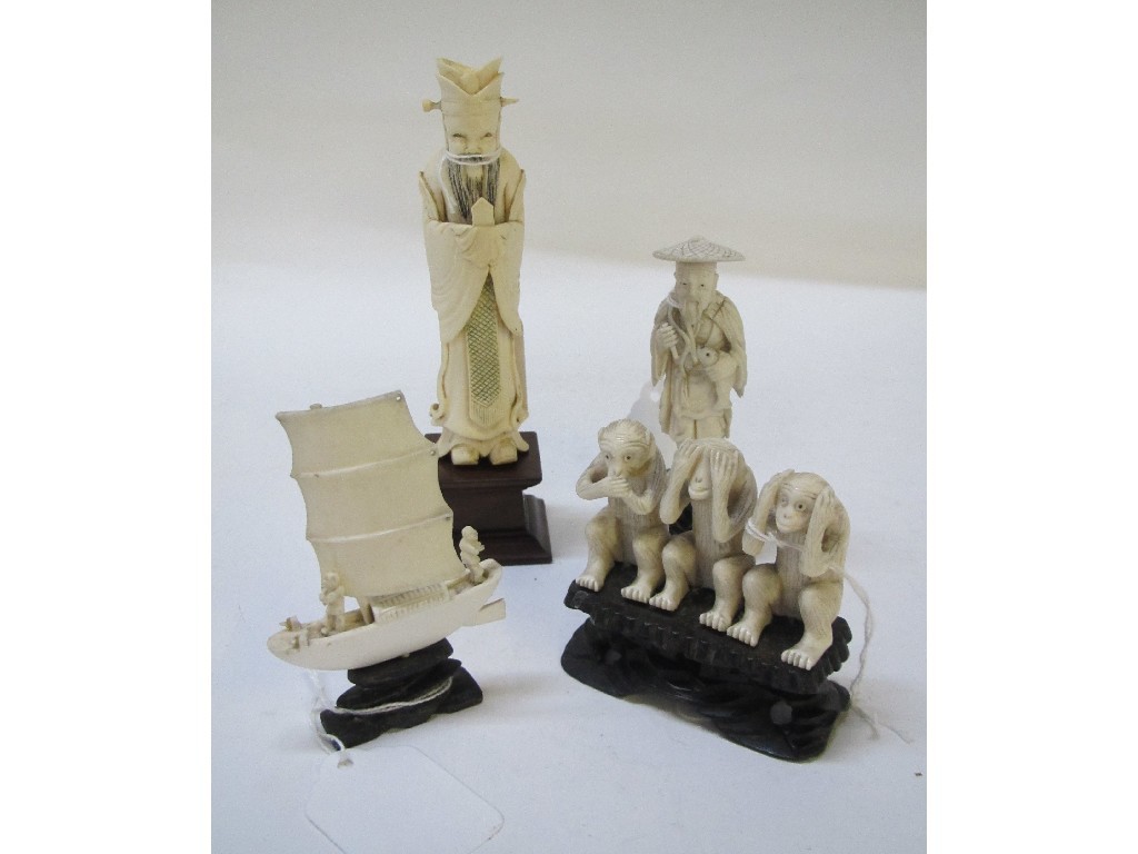 Appraisal: Lot comprising four ivory carvings - male and female figures