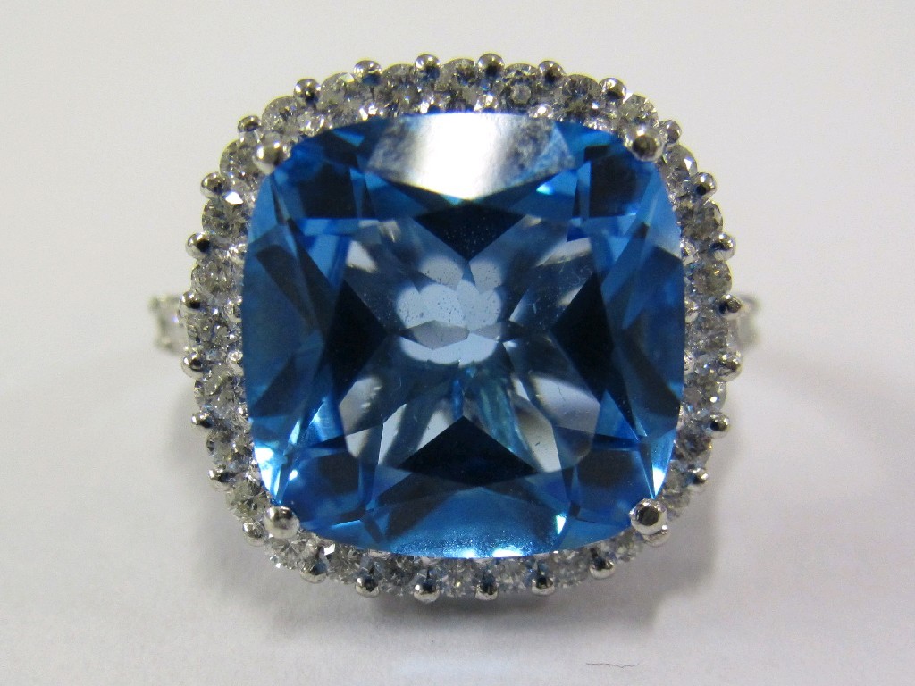 Appraisal: Eighteen carat white gold blue topaz and diamond cluster ring