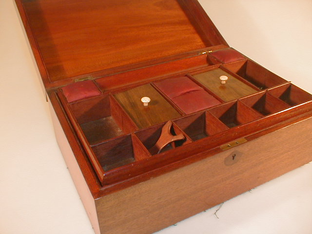 Appraisal: A Victorian mahogany work box with fitted tray interior