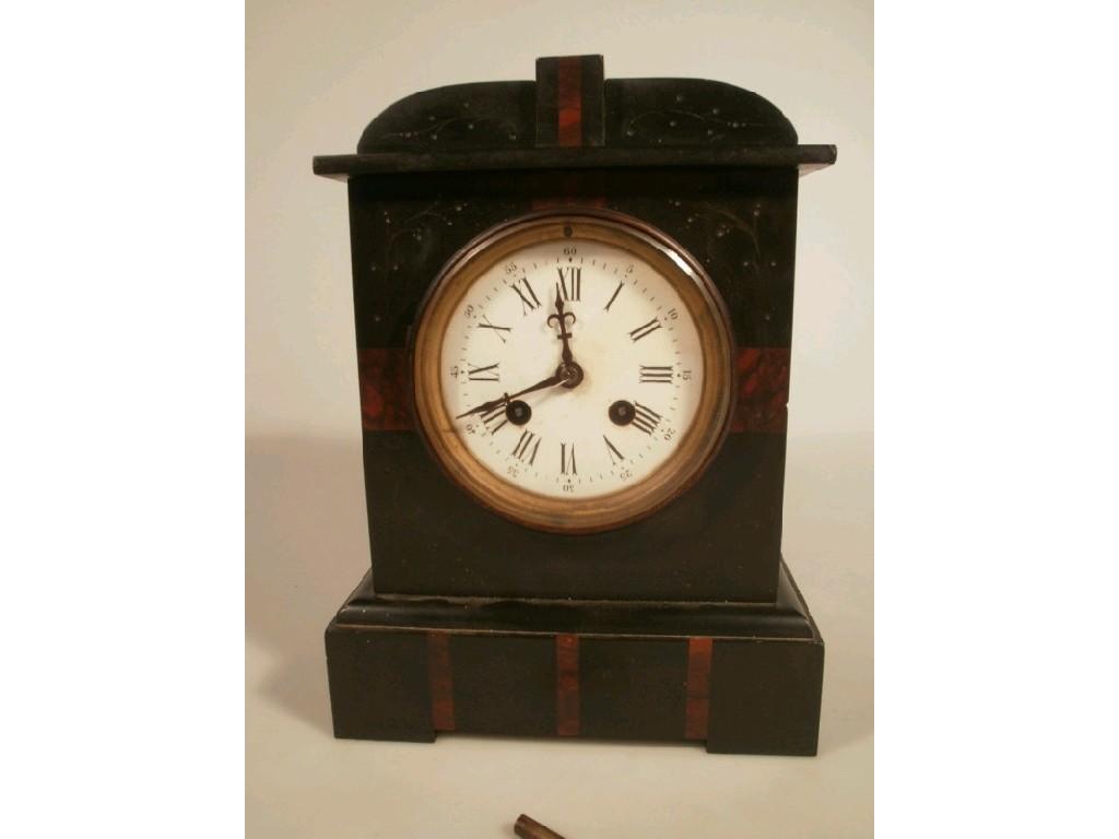 Appraisal: A Victorian polished slate mantel clock with liver marble inlays