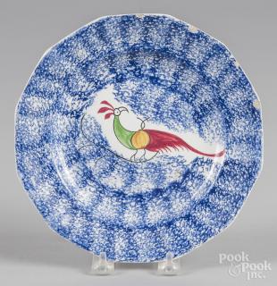 Appraisal: Blue spatter plate with peafowl decoration '' dia