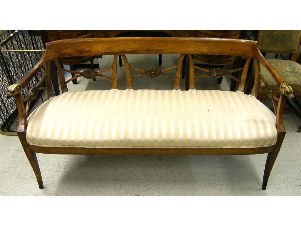 Appraisal: Unusual Continental satinwood three seater banquette settee the back with