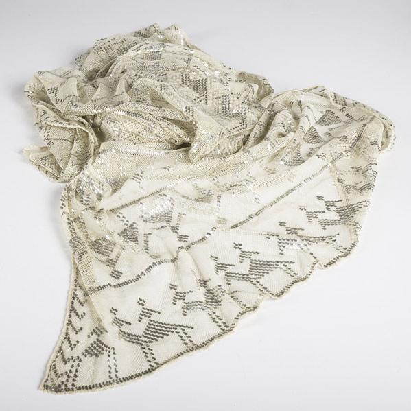 Appraisal: SILVER EMBOSSED SHAWL Net fabric overlaid with silver th C