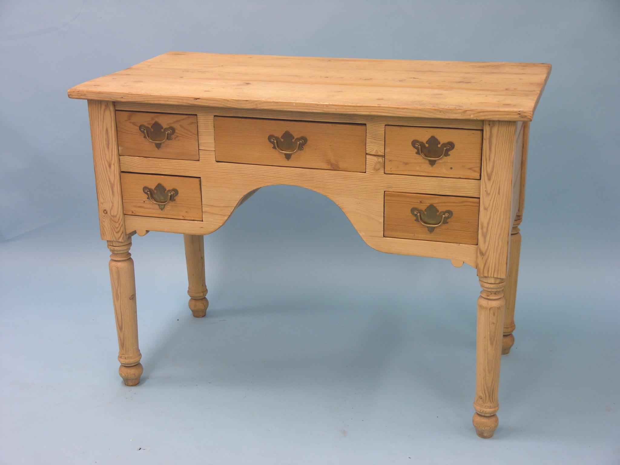 Appraisal: A Victorian stripped pine writing table kneehole arrangement of five