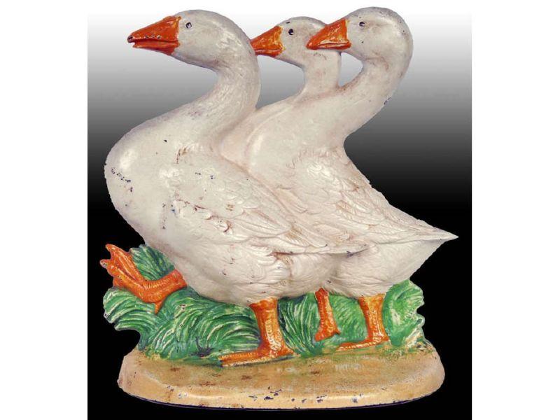 Appraisal: Three Geese Cast Iron Doorstop Description '' x '' Made