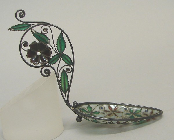 Appraisal: Spoon features floral motif in bowl and three dimensional red