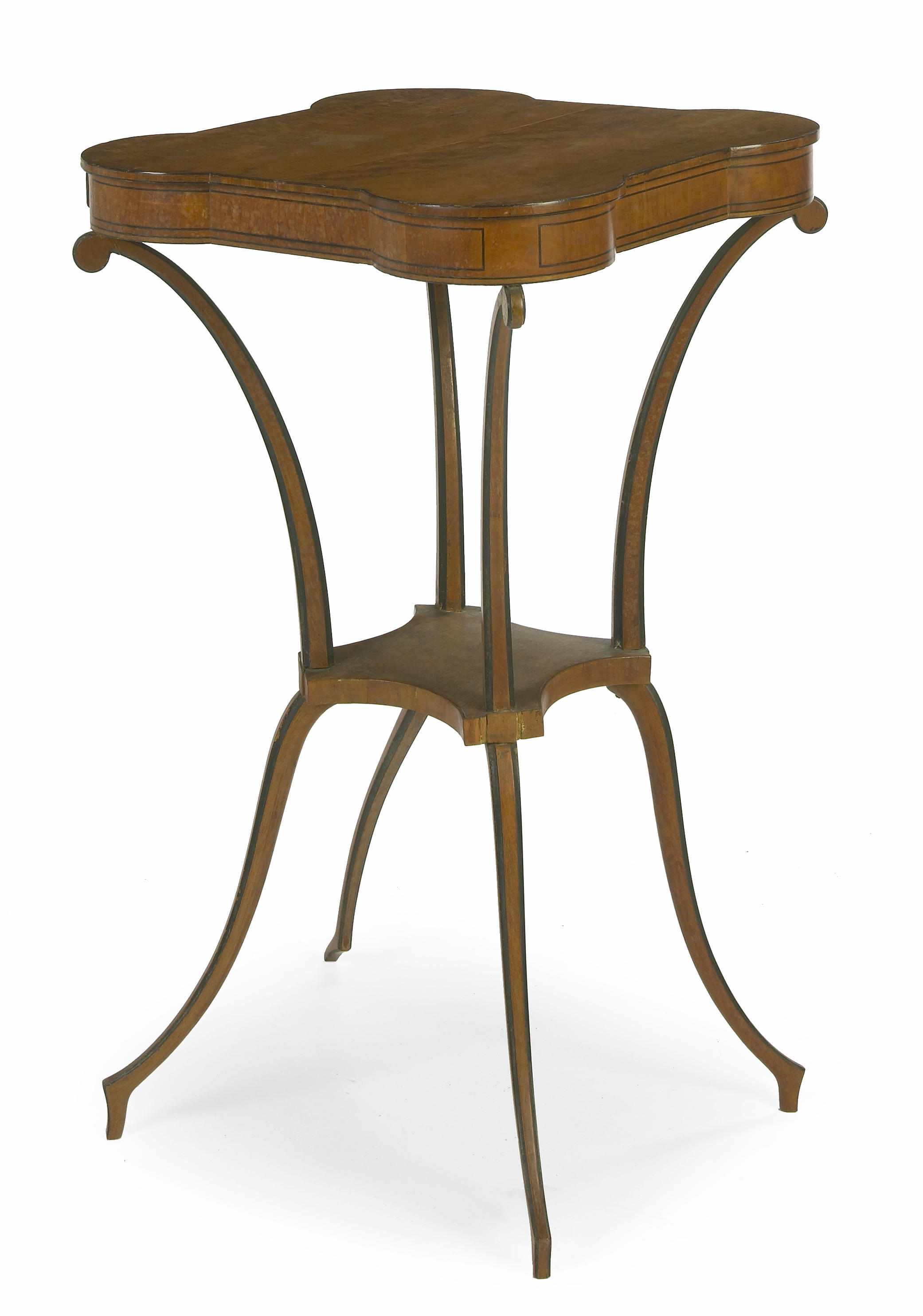 Appraisal: A George III ebony lined satinwood occasional table fourth quarter