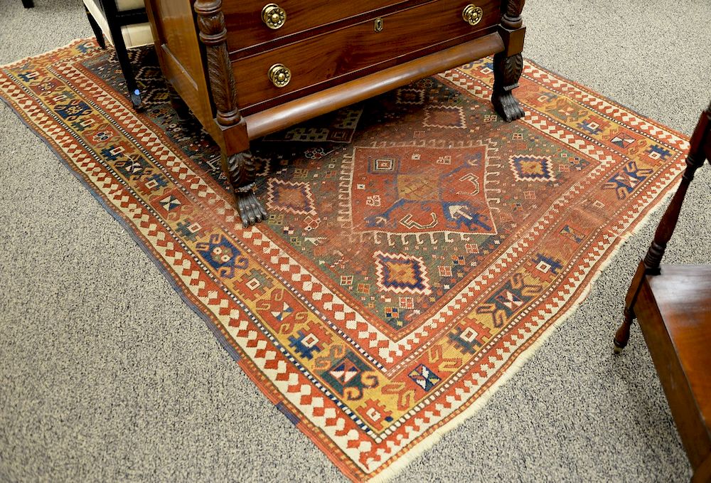 Appraisal: Caucasian area rug th century very worn ' x '