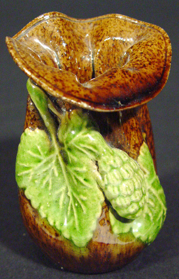 Appraisal: Small Rye Pottery purse vase relief moulded with hops and