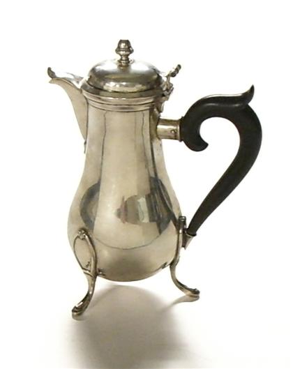 Appraisal: Continental silver coffeepot th century Pear shape with ebony lyre-form