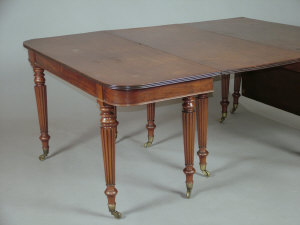 Appraisal: A Regency mahogany dining table comprising of a centre drop