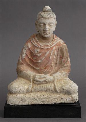 Appraisal: GANDHARAN STUCCO FIGURE OF BUDDHA Modeled round seated with hands