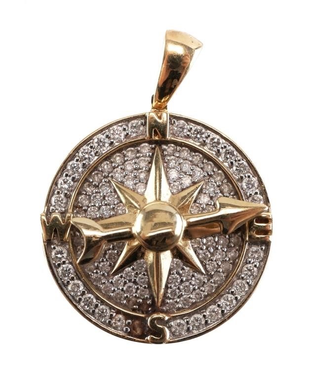 Appraisal: K yellow gold and diamond compass pendant Approx mm in