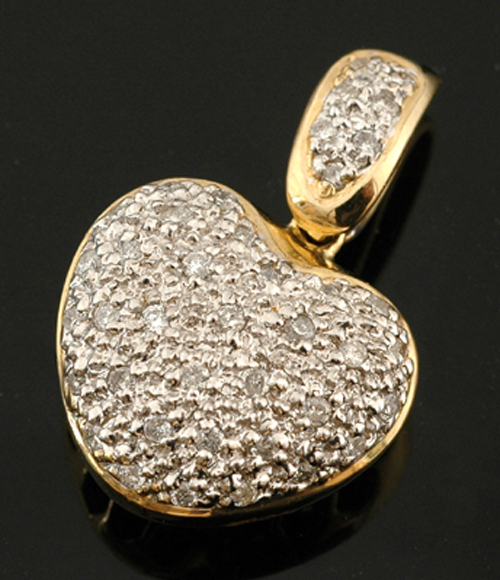 Appraisal: DIAMOND SET HEART PENDANT IN CT GOLD