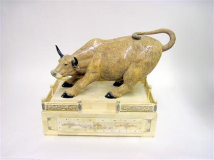 Appraisal: Large Chinese bone and polychrome decorated buffalo figureStanding over plinth