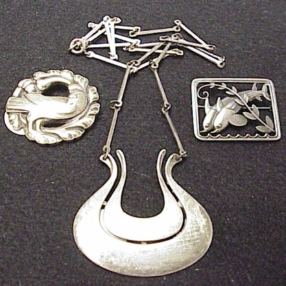 Appraisal: JEWELRY Georg Jensen sterling silver dolphin pin sterling silver David