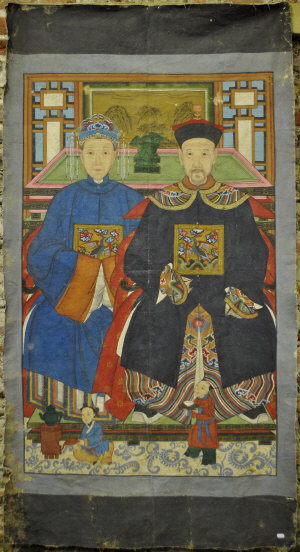 Appraisal: A Chinese ancestral double portrait of a husband and wife