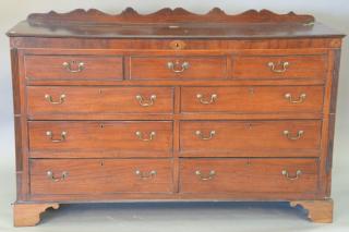 Appraisal: George III mahogany lift top chest with nine drawers th