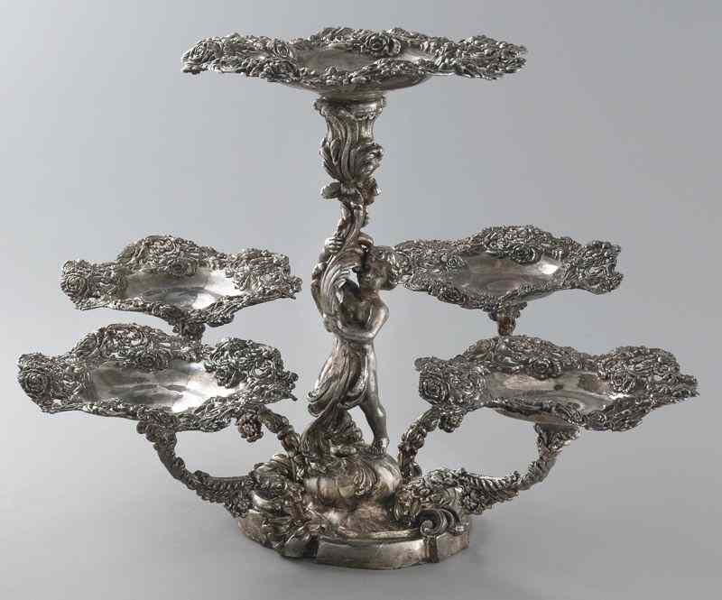 Appraisal: Continental silver plate epergne the central bowl raised on a