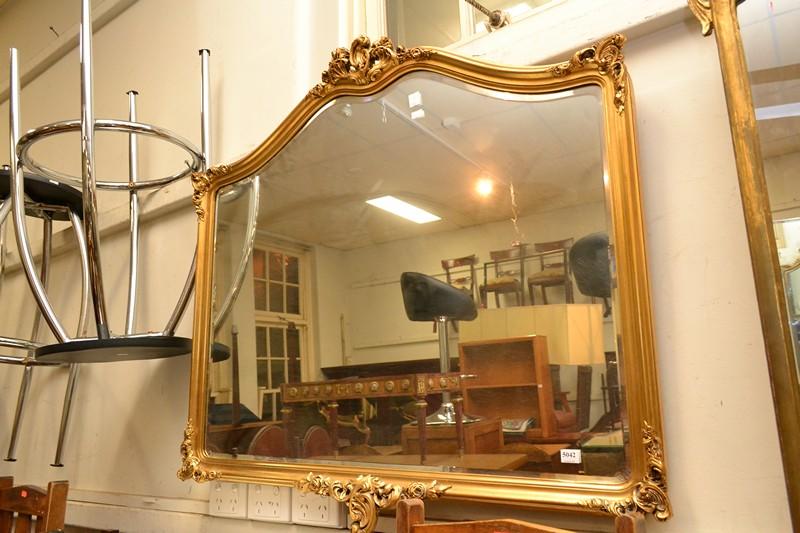 Appraisal: A ROCOCO STYLE GILT WALL MIRROR WITH BEVELLED EDGE A