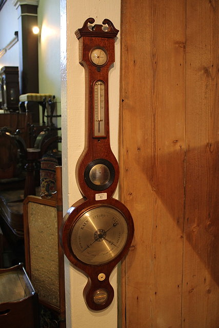 Appraisal: A TH CENTURY MAHOGANY WHEEL BAROMETER by C Borelli of